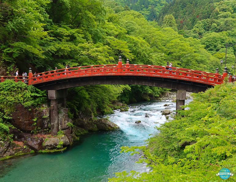 https://www.theinvisibletourist.com/wp-content/uploads/2022/06/shinkyo-bridge-nikko-summer.jpg