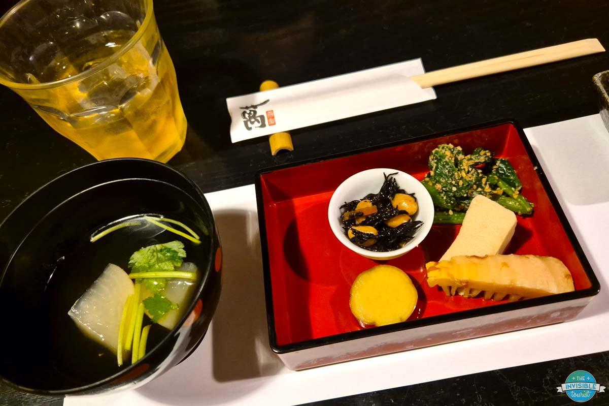 A traditional dinner in Kyoto, chopsticks at the ready