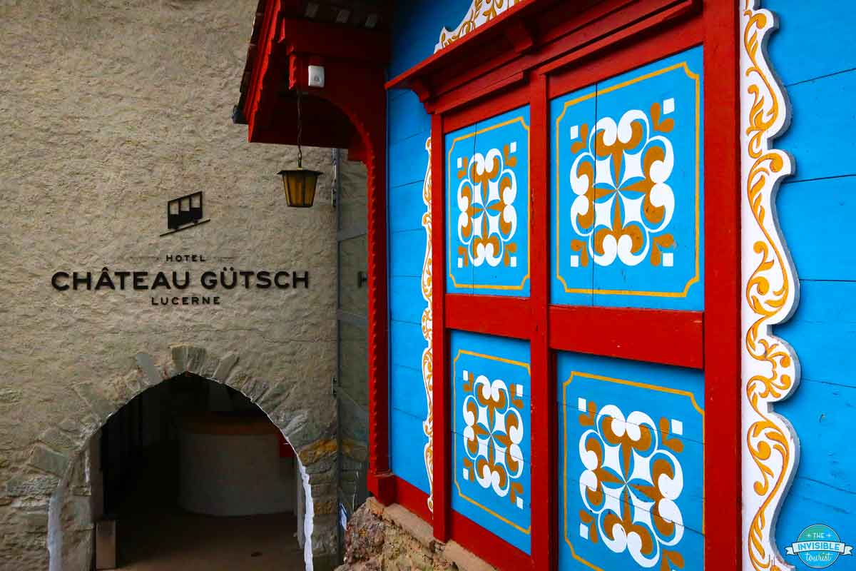 Ornate blue shutters at Château Gütsch, Lucerne