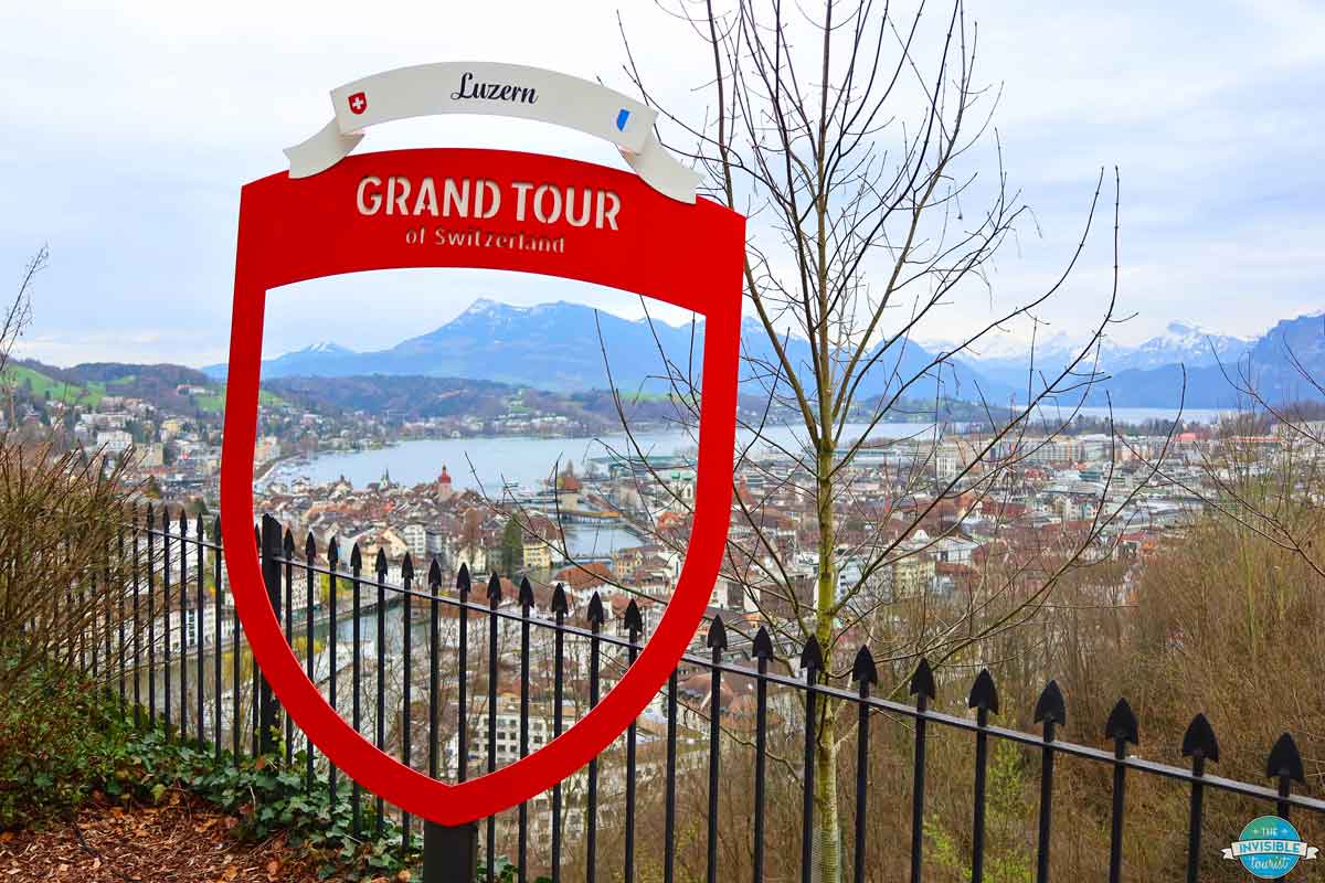 Grand Tour of Switzerland signpost overlooking Lake Lucerne