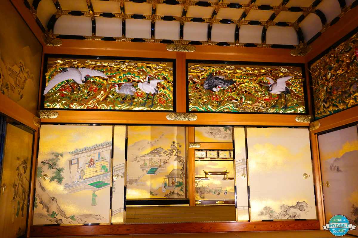 Carved transoms and painted sliding doors inside Hommaru Palace, Nagoya Castle