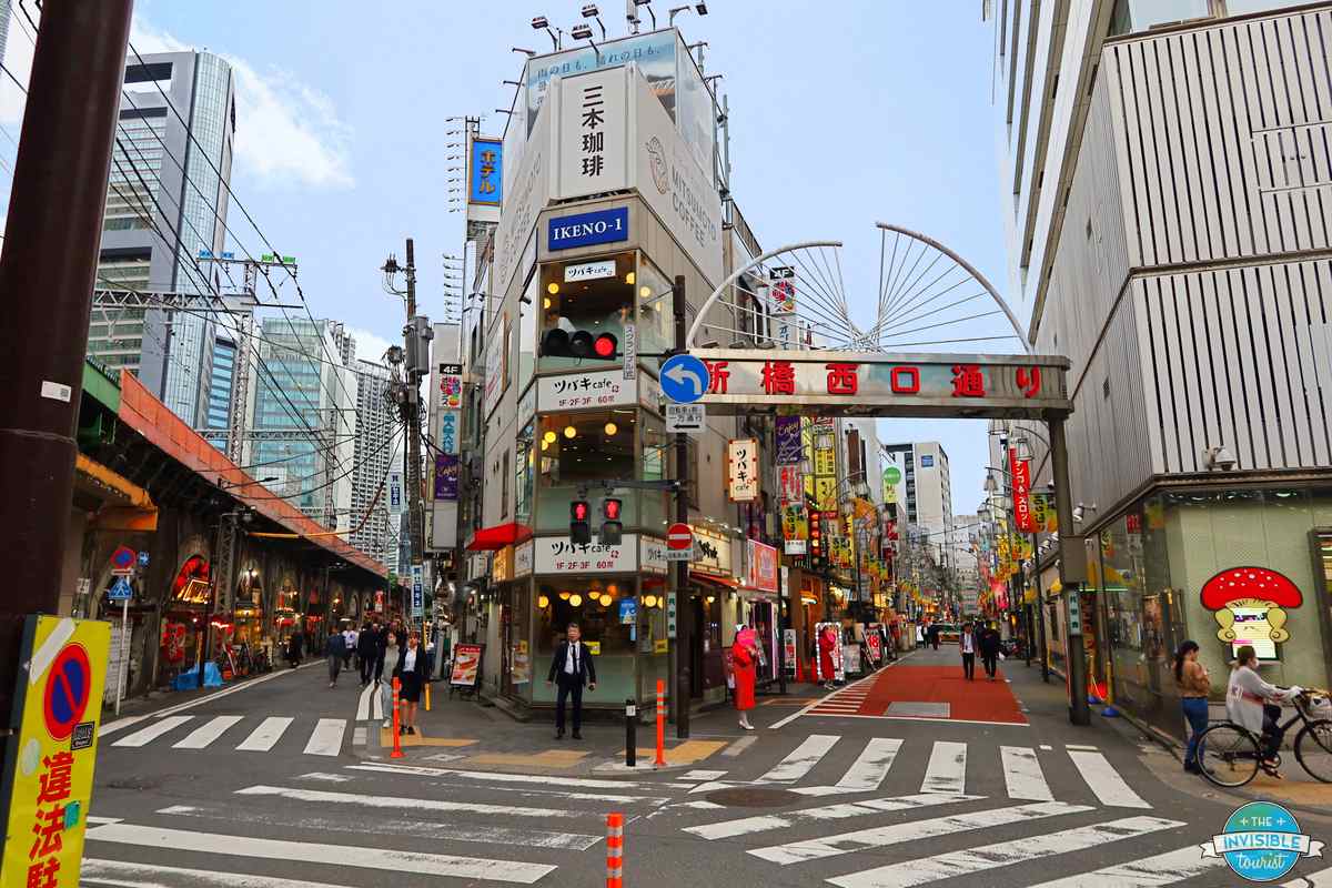 Shimbashi Nishiguchi-dori in Tokyo, with izakaya under the railway arches on the left