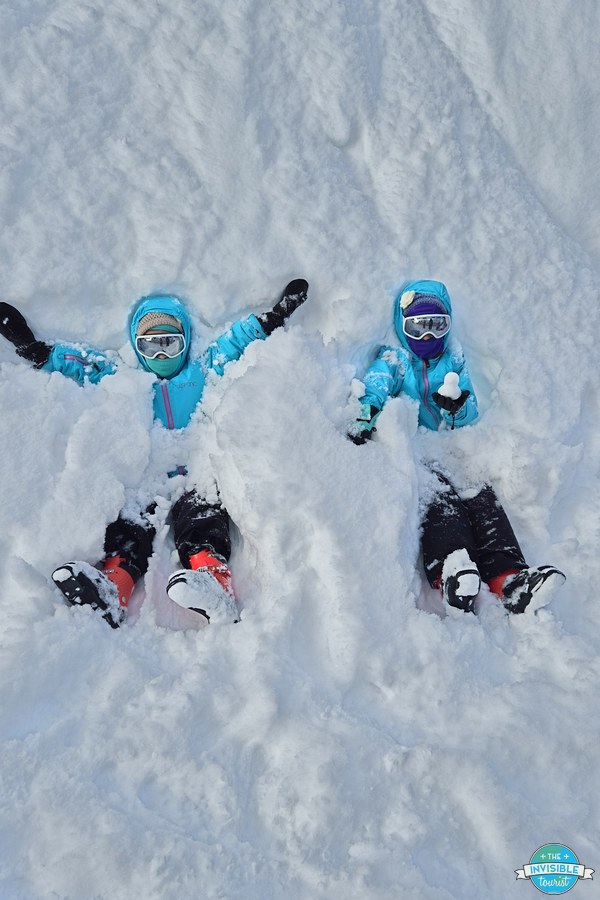 Children making snow angels near the Terrace of Frosted Tree, Tomamu