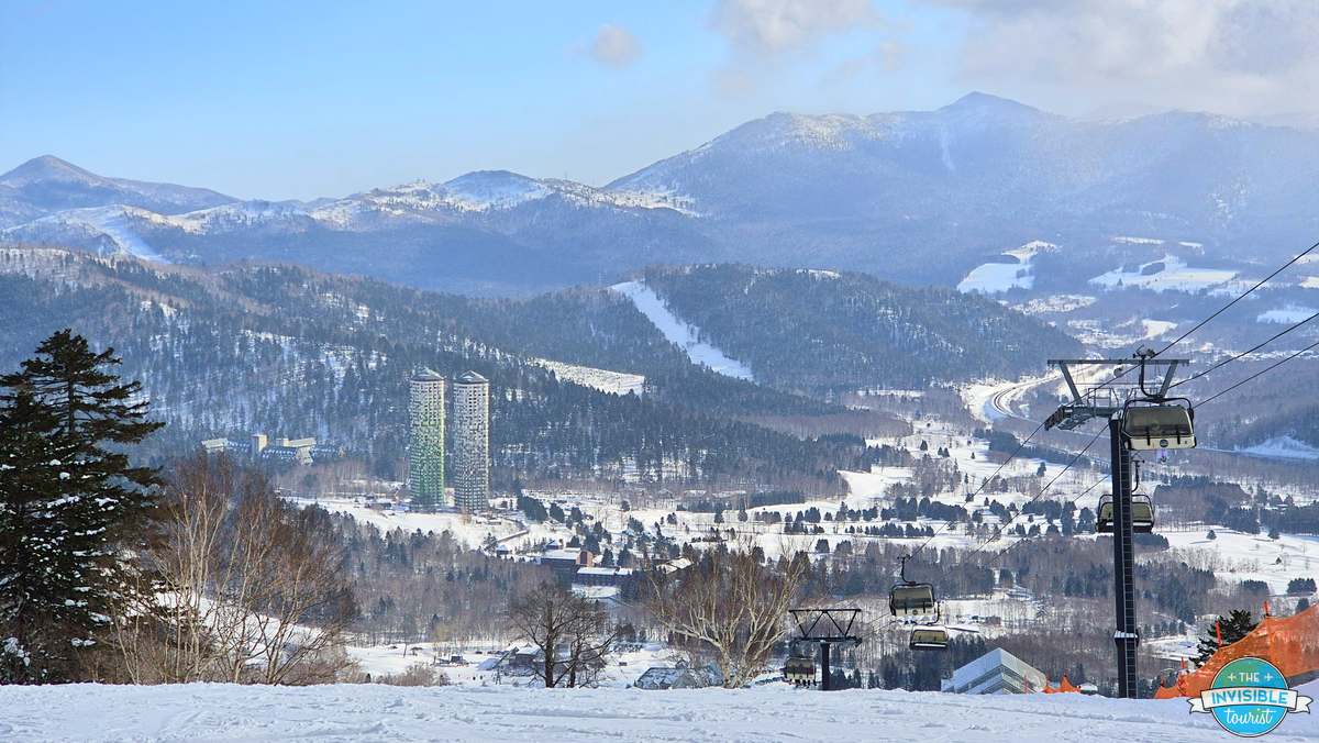 View over Tomamu ski resort and the Risonare towers from the top of a run