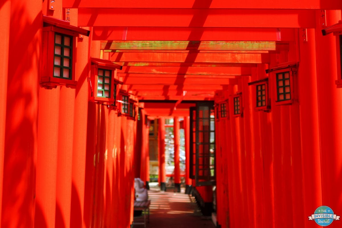 Tunnel of red torii gates at Sairaiin Temple, Naha, Okinawa