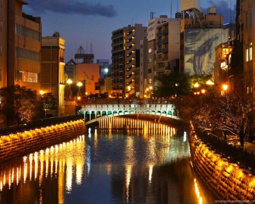 2 Day Nagoya Itinerary: Nayabashi Bridge lit up at night over the Hori River | The Invisible Tourist